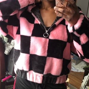 Pink and black checkerboard half zip fuzzy hoodie